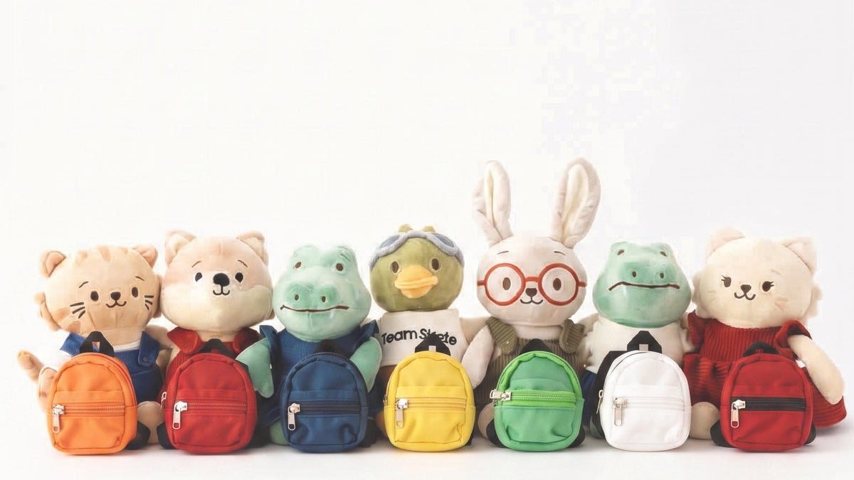 peluches renard, tigre, crocodile, canard, lapin et chat